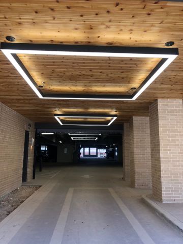 Linear Square lighting installation at a parking lot 